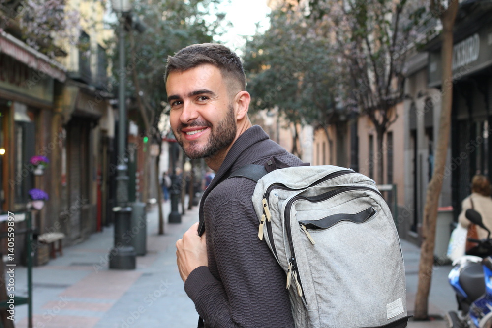 Handsome healthy man smiling in the city Handsome healthy man smiling in the city