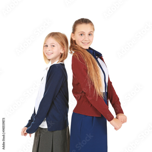 Two cute girls in school un...