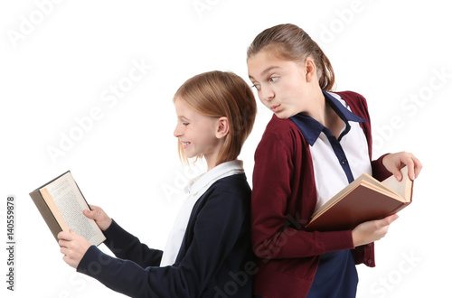Two cute girls in school un...