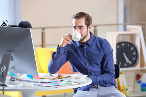 Stylish designer drinking c...
