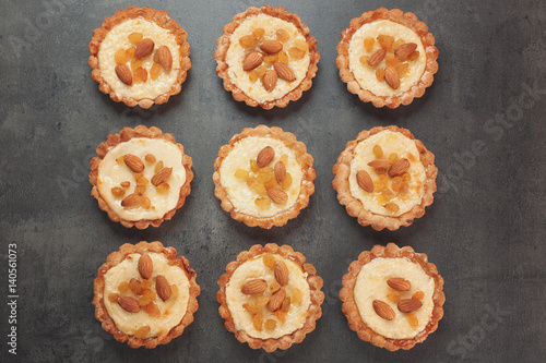 Wallpaper Mural Delicious crispy tarts with almond and raisins on table Torontodigital.ca