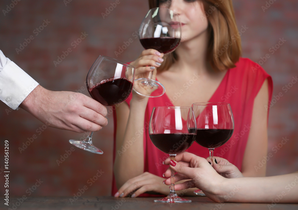 People with wine glasses at restaurant People with wine glasses at restaurant