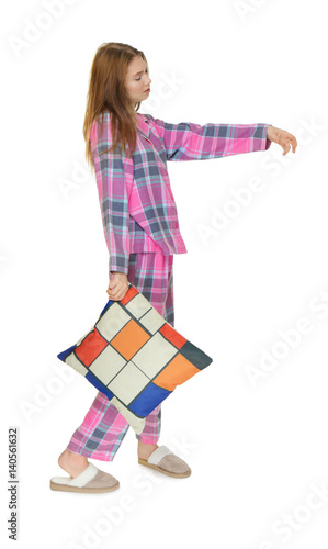 Young sleepy woman with pil...