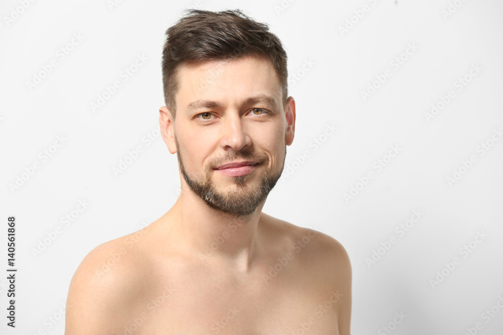 Handsome young man posing on white background Handsome young man posing on white background