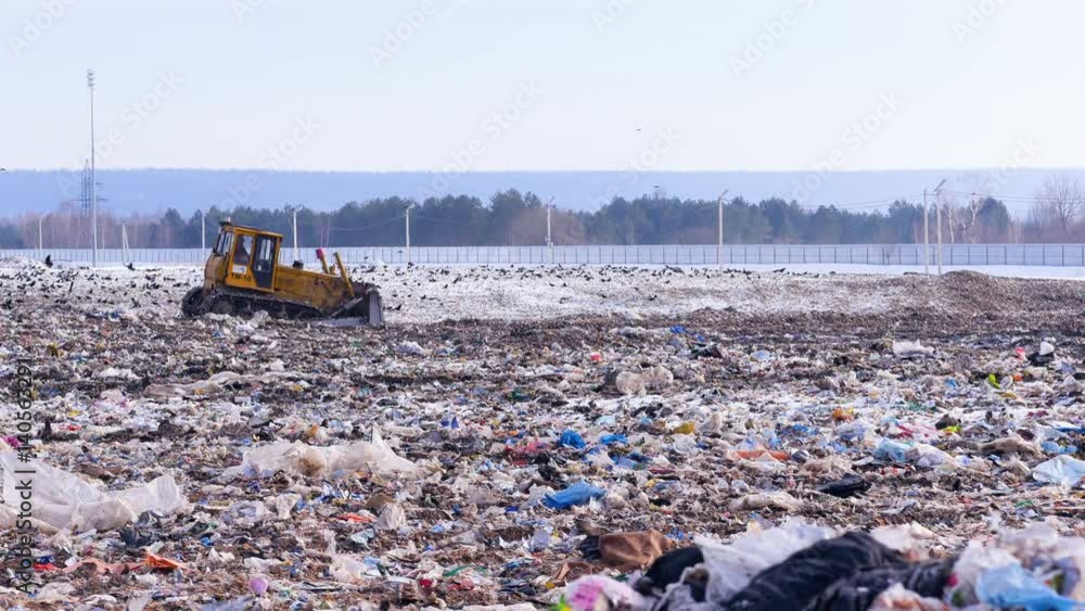 Truck working in a landfill site. 4K. Truck working in a landfill site. 4K.
