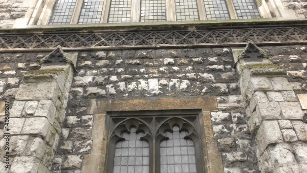 Different windows of an old and stone building. Different windows of an old and stone building.