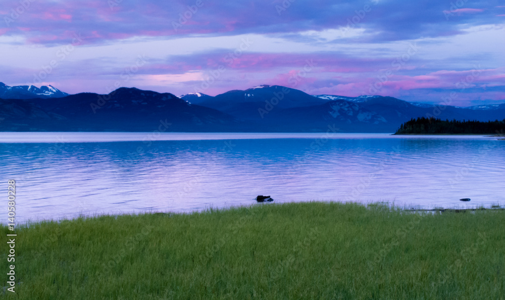 Calm evening landscape Lake Laberge Yukon Canada