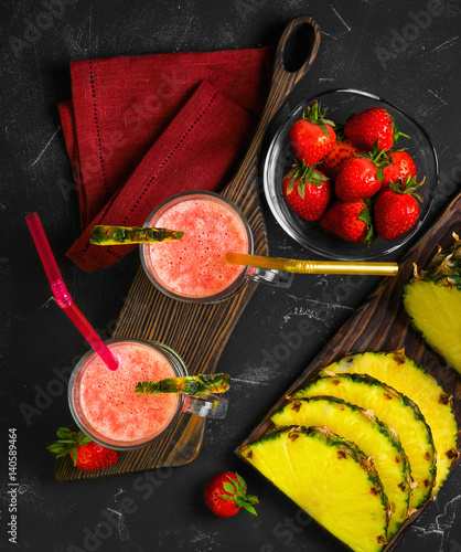 Fruit cocktail smoothie with strawberries and pineapple