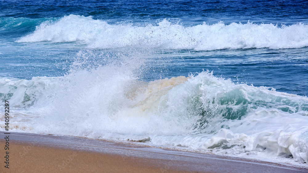 Breaking wave. Empty green wave rolls through to beach with no surfer in view Breaking wave. Empty green wave rolls through to beach with no surfer in view