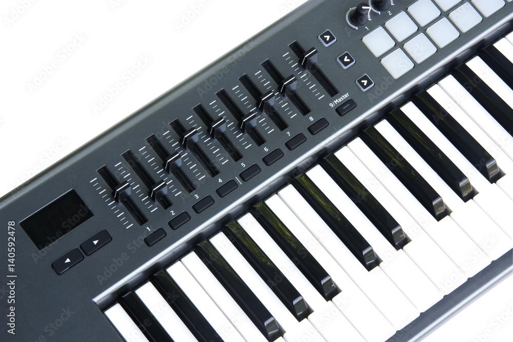 synthesizer Keyboard with Fader And Touch Pad on white background synthesizer Keyboard with Fader And Touch Pad on white background