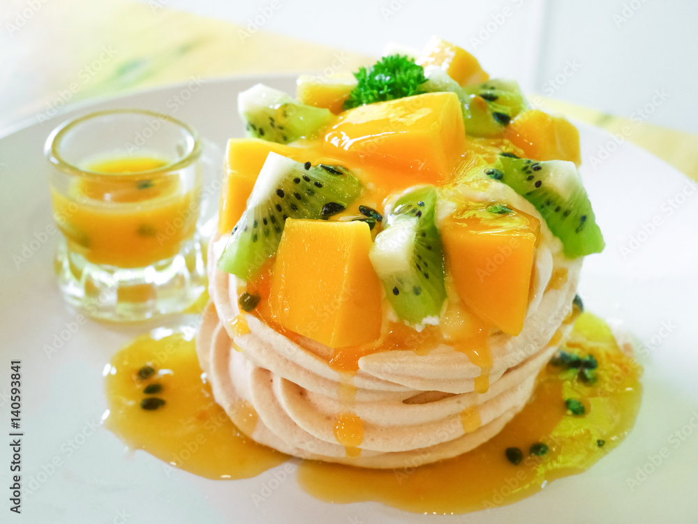 delicious tropical pavlova with kiwi and mango delicious tropical pavlova with kiwi and mango