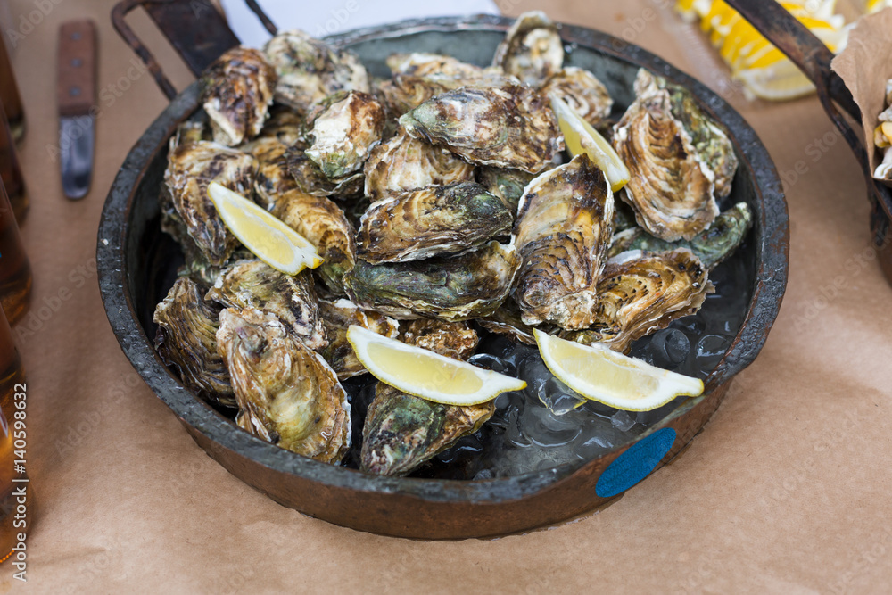 Plenty of seafood, oysters on grill pan Plenty of seafood, oysters on grill pan