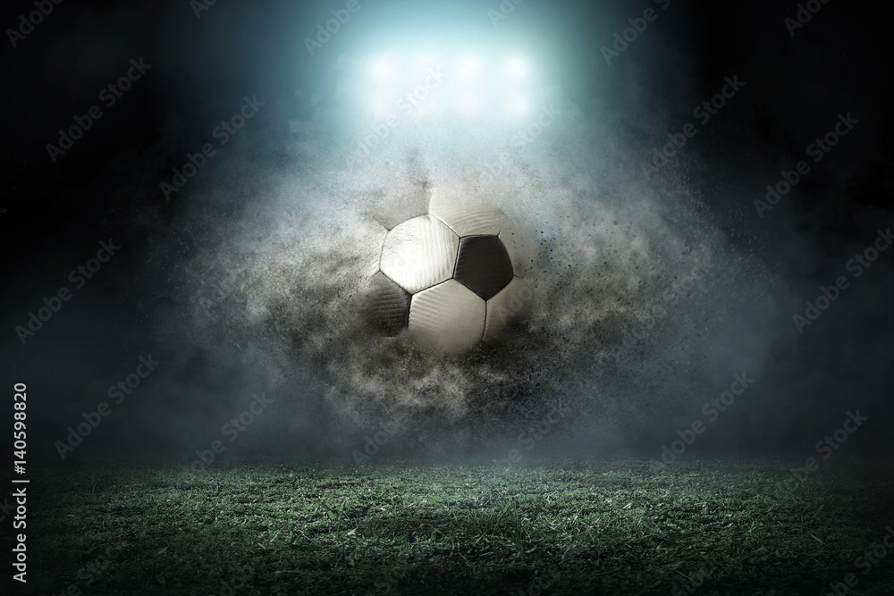 Naklejka Gracz piłki nożnej z piłką w akci outdoors
