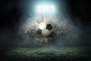 Soccer player with ball in action outdoors