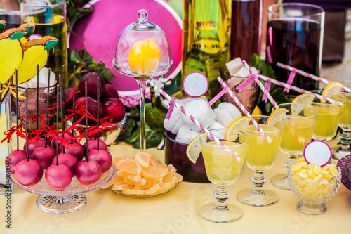 Delicious sweeties and beverages, staying on dessert table