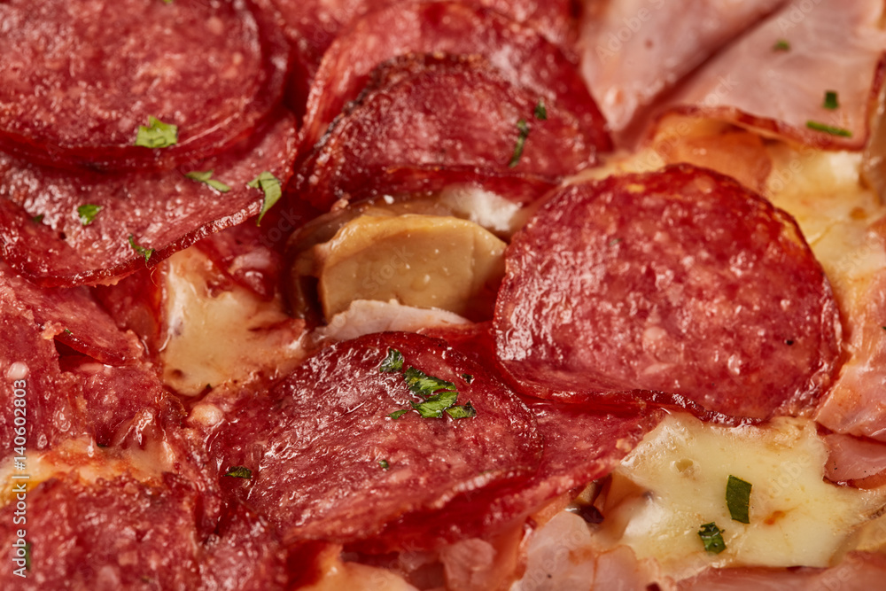 meat pizza with salami closeup macro view meat pizza with salami closeup macro view