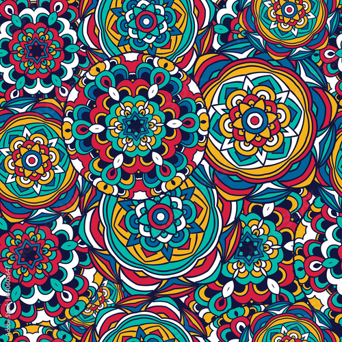  Seamless pattern. Tribal texture with a mandala element.