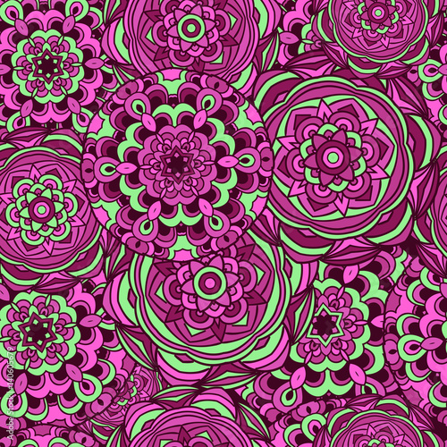  Seamless pattern. Tribal texture with a mandala element.
