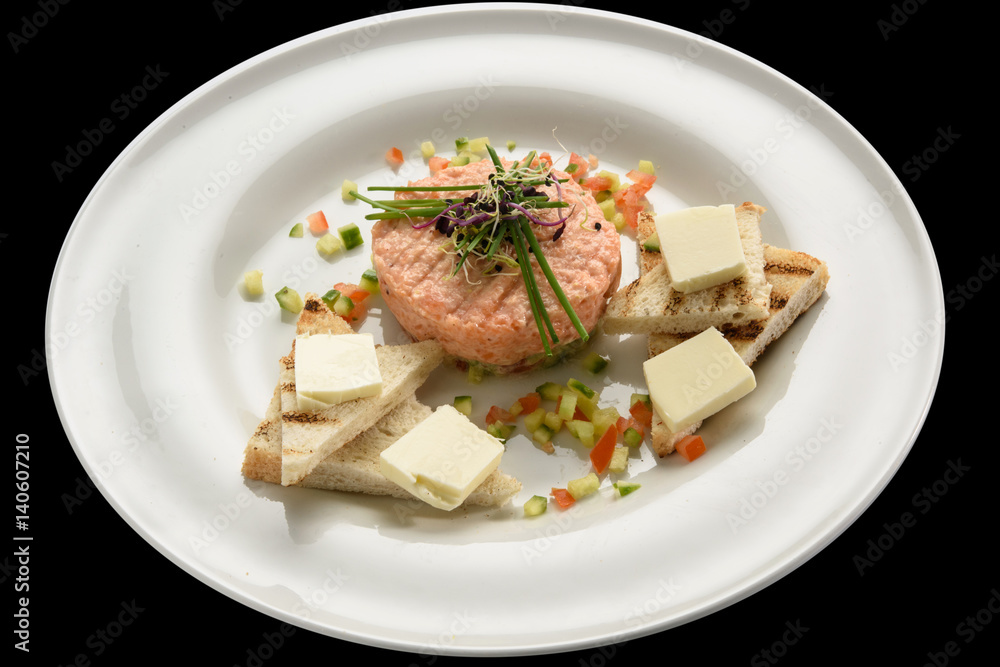Fresh tartar with salmon, cucumber on white plate, Fresh tartar with salmon, cucumber on white plate,