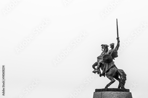 Statue of King Svatopluk in front of Bratislava Castle in black and white