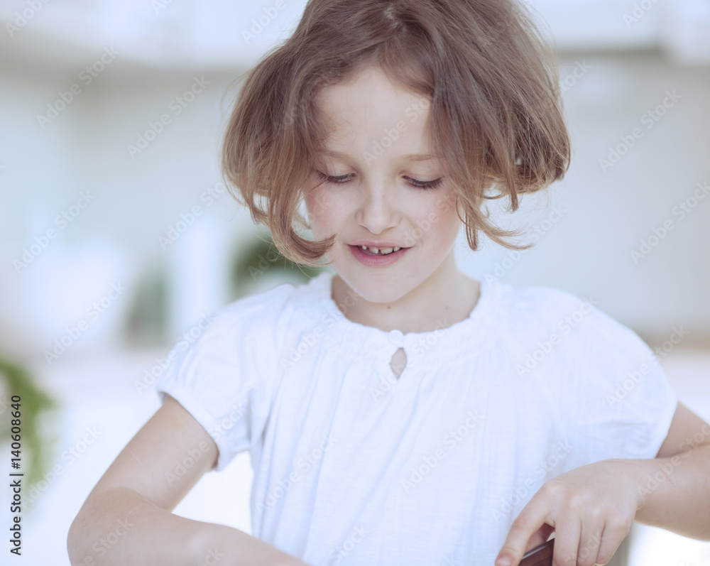 Close-up portrait of young girl chopping food in kitchen Close-up portrait of young girl chopping food in kitchen