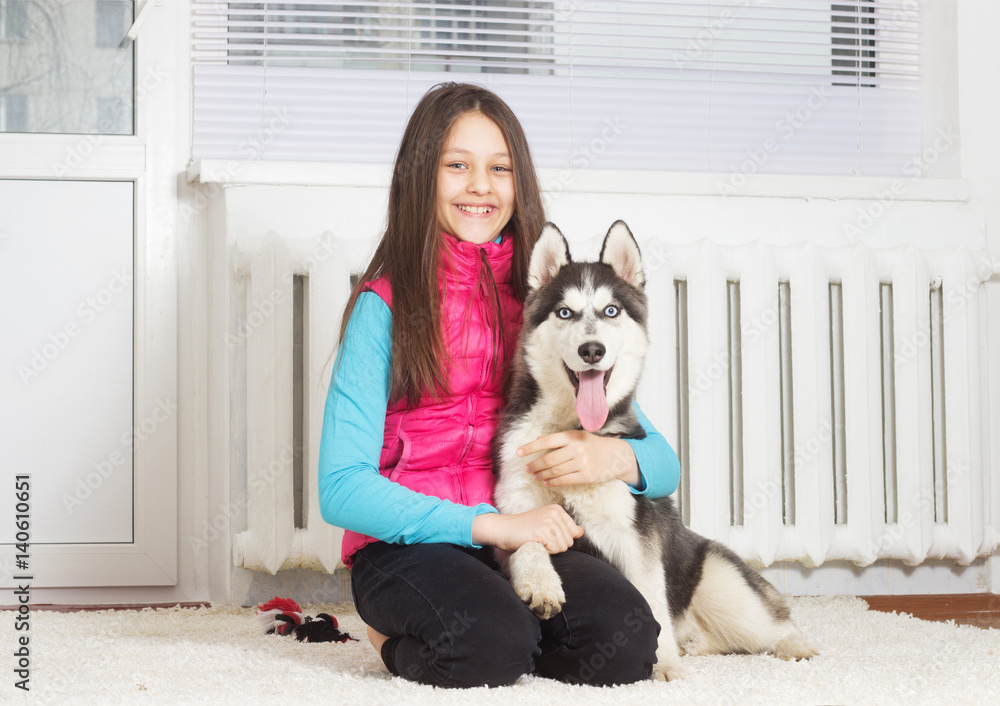 Child and husky in the apartment Child and husky in the apartment