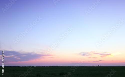Beautiful sunset in wheat field © Africa Studio
