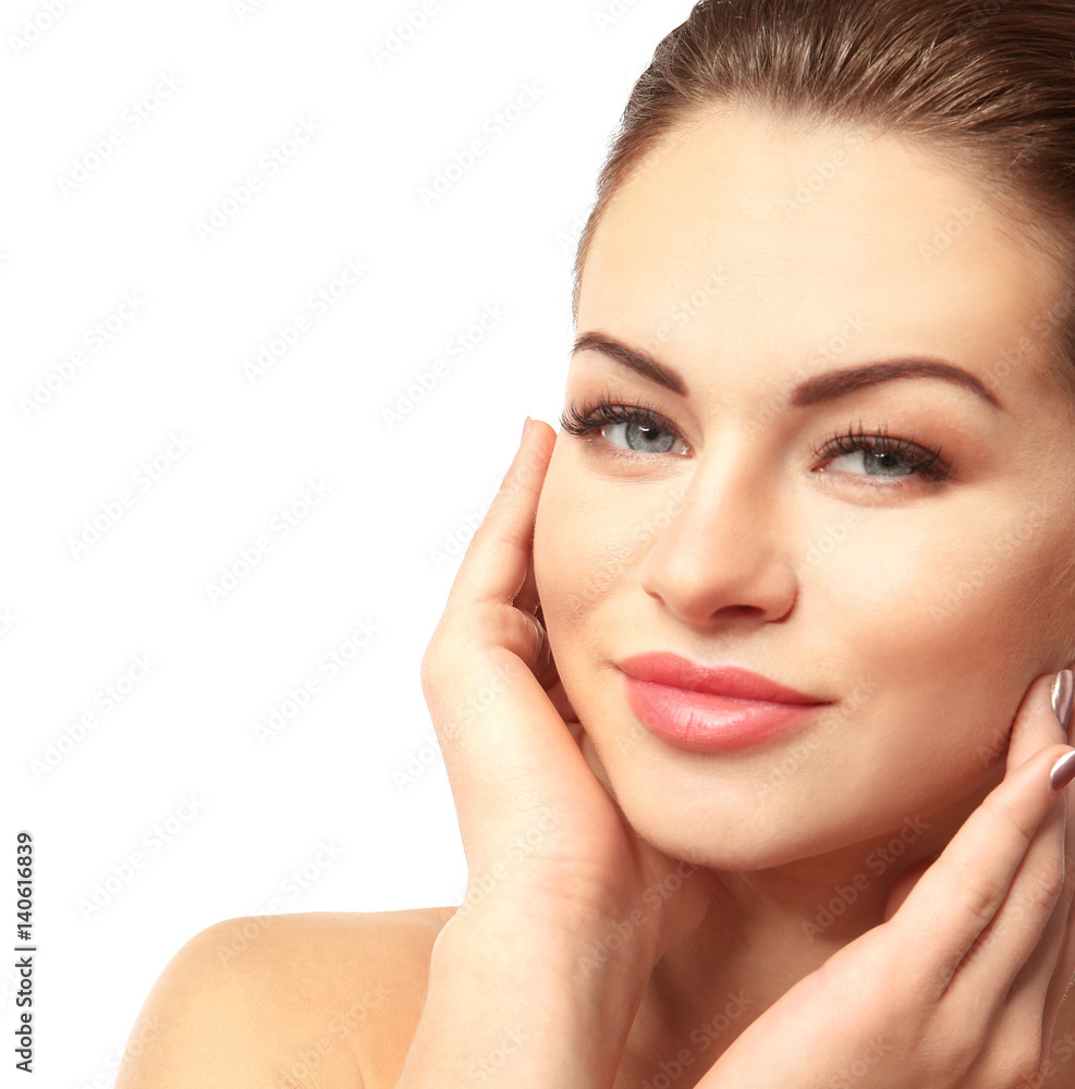 Portrait of beautiful young woman on white background