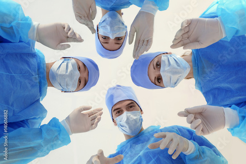 Young doctors in clinic, bo...