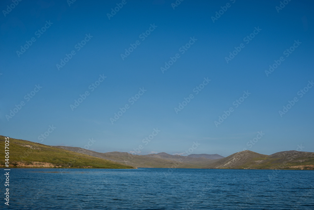 Baikal lake near Khuzhir villahe at Olkhon island in Siberia, Russia Baikal lake near Khuzhir villahe at Olkhon island in Siberia, Russia
