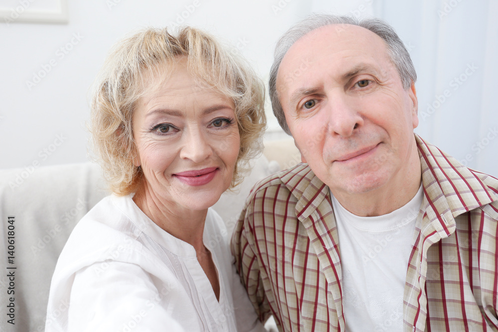 Closeup portrait of happy senior couple at home Closeup portrait of happy senior couple at home
