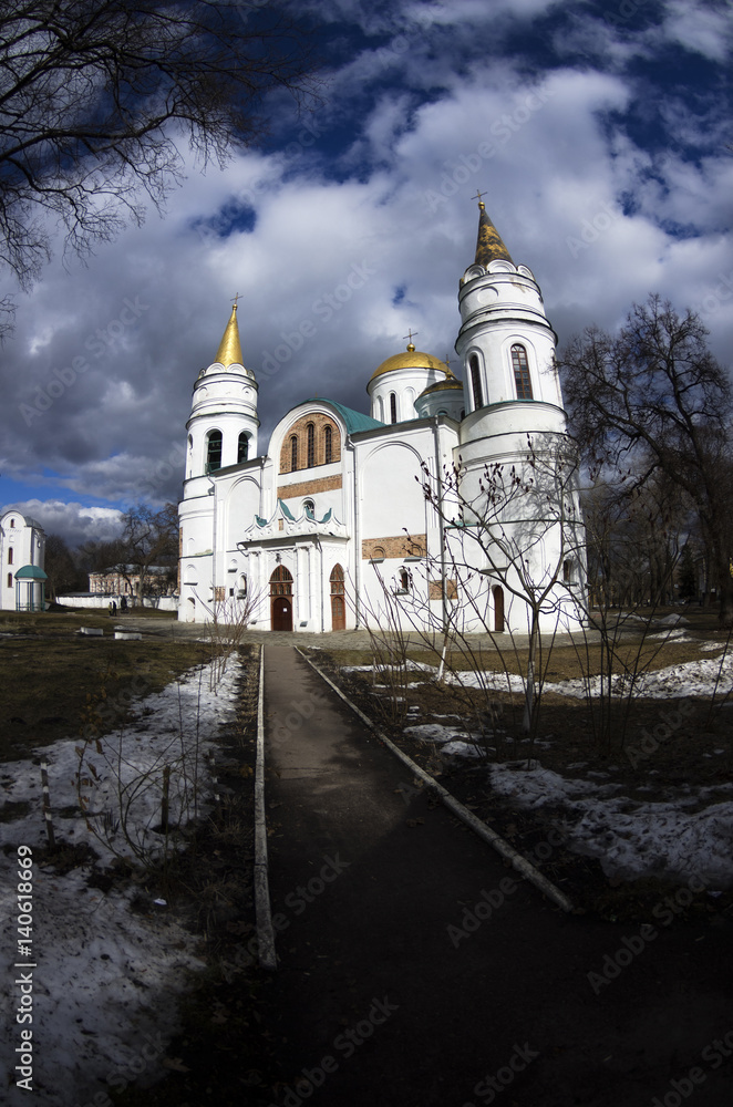 The Transfiguration Cathedral in Chernigiv in the spring day, cloudy sky photo shoot with fisheye lens, March, Ukraine