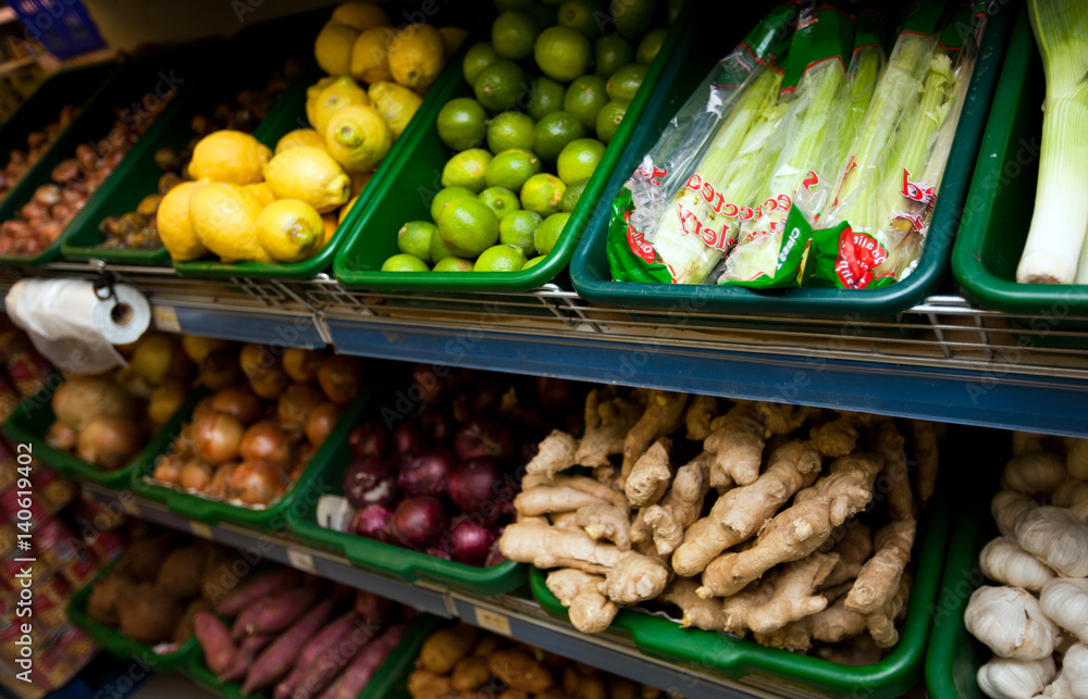 Various vegetables on display in grocery store