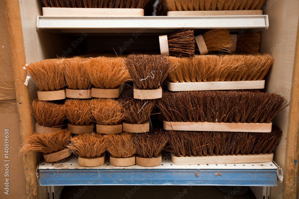 Stacked brushes in supermarket