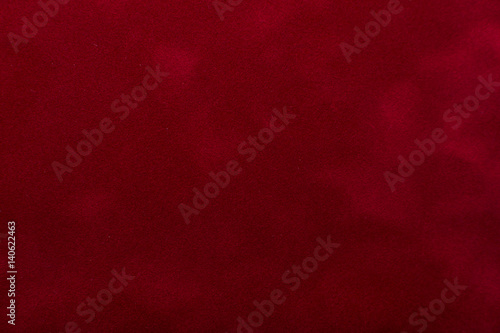 Red velvet textile as background photo