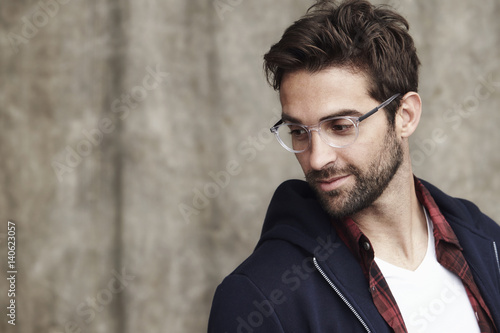 Glasses dude in hoodie in studio © sanneberg