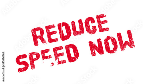 Reduce Speed Now rubber stamp. Grunge design with dust scratches. Effects can be easily removed for a clean, crisp look. Color is easily changed.