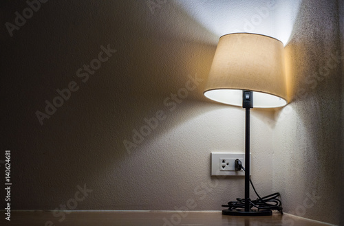 One lamp in dark room