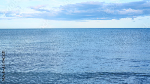 blue sea and cloudy sky