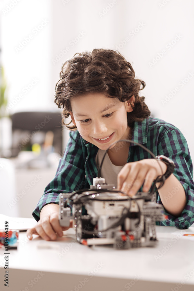 Genius teen boy studying science in the studio Genius teen boy studying science in the studio