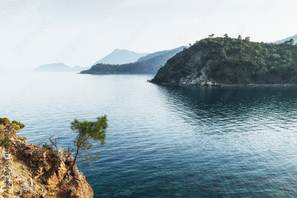 blue sea wave of mediterranean on turkish coast in the eveni blue sea wave of mediterranean on turkish coast in the eveni