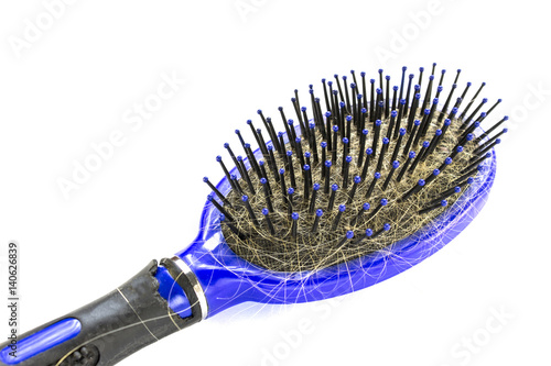 Hair brush with hair . beginning of hair loss and alopecia