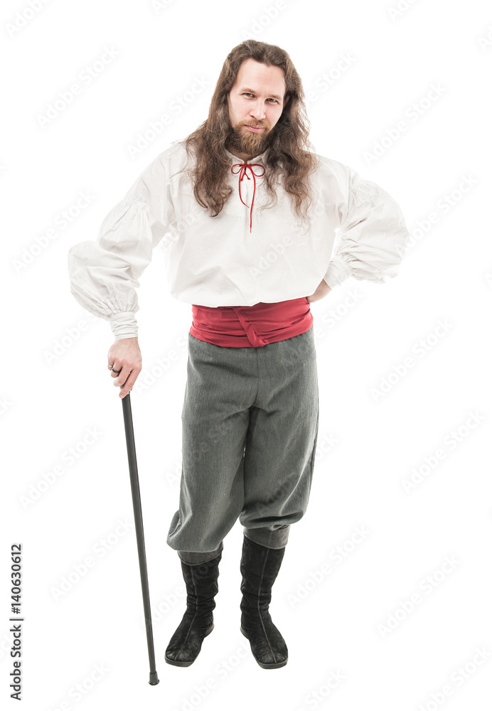 Handsome man in historical pirate costume with cane isolated