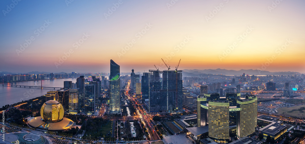 cityscape and skyline of modern city at dawn