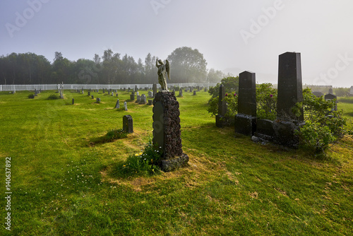 Rural landscape, small cemetery on the island Vagsoy, Norway photo