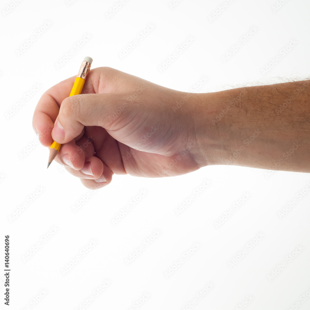 Man holds yellow pencil Man holds yellow pencil