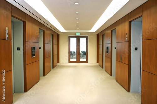 Empty hallway between elevators