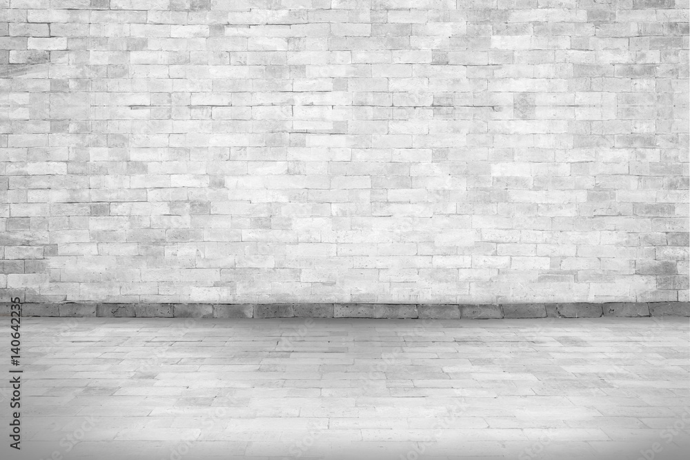 Abstract white interior of empty room with concrete wall and floor and picture frame of old vintage White brick wall Abstract white interior of empty room with concrete wall and floor and picture frame of old vintage White brick wall