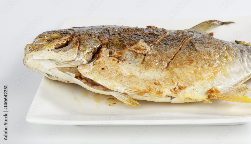 Yellow pomfret isolated on white background Yellow pomfret isolated on white background