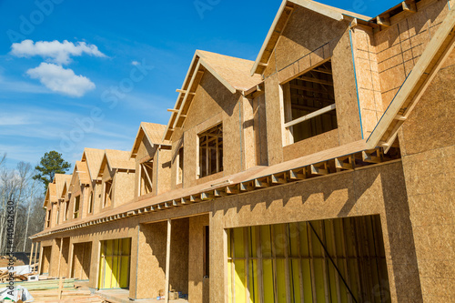 Fotografija New Wood Townhouse Construction